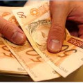 Governo estima salário mínimo de R$ 779 para 2015
